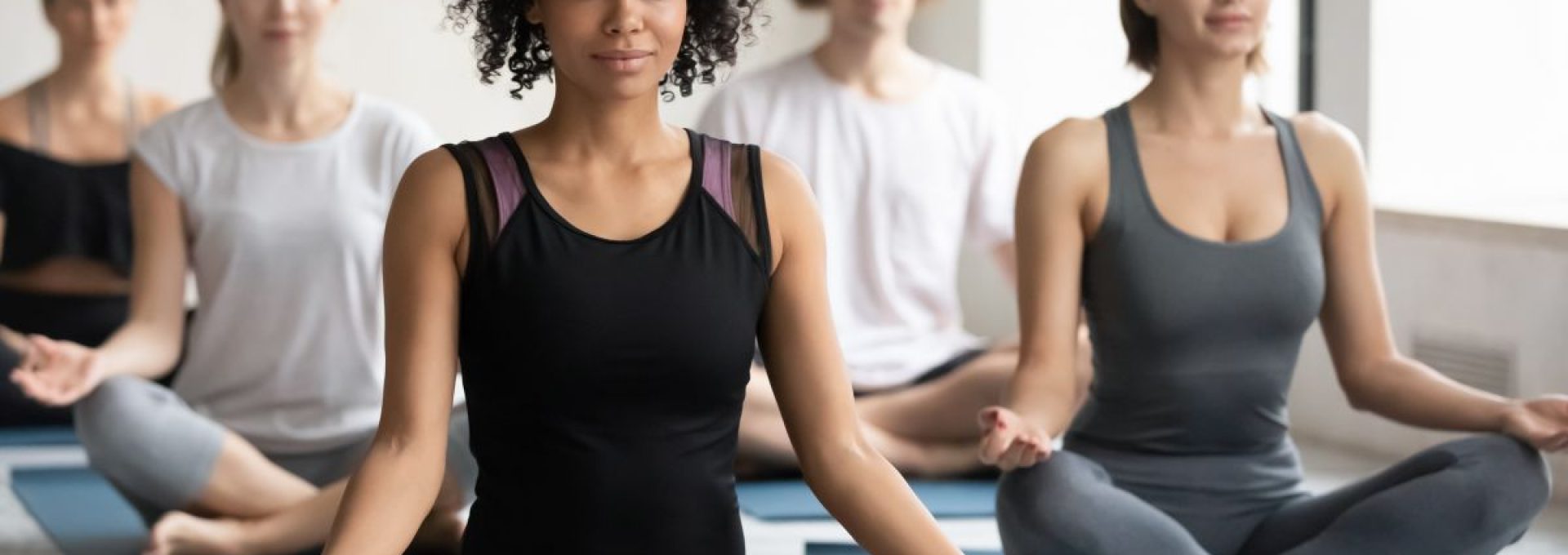 Peaceful,Young,African,American,Healthy,Woman,Sitting,In,Lotus,Position